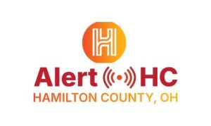 Logo for Alert HC, Hamilton County, OH, featuring an orange circle with a white "H" above red text reading "Alert" and a red siren icon next to "HC," with "HAMILTON COUNTY, OH" in yellow below.