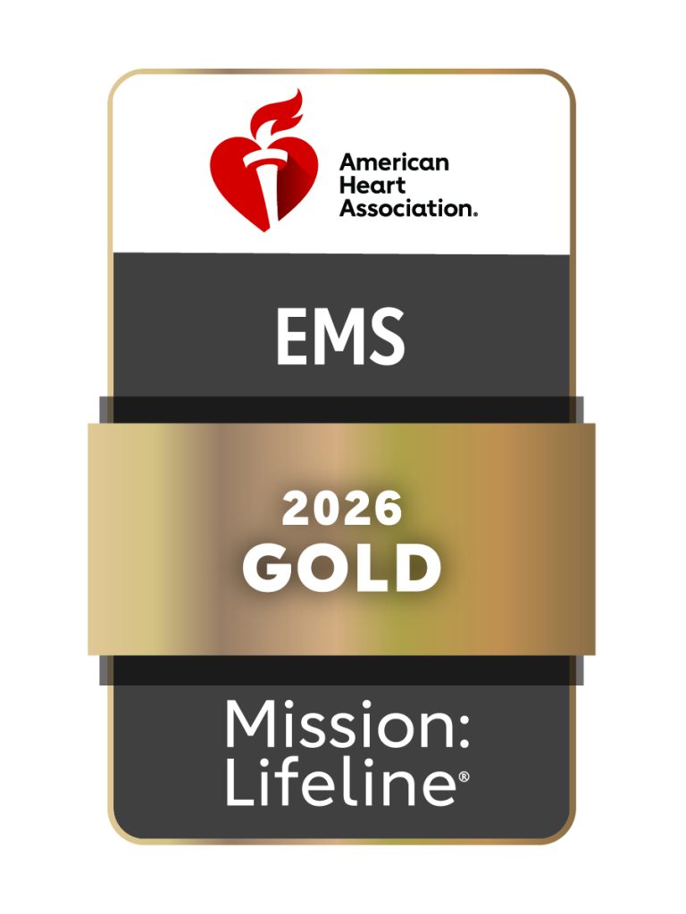 American Heart Association badge with a red heart logo, text "EMS 2026 GOLD," and "Mission: Lifeline" on a gold and black background.