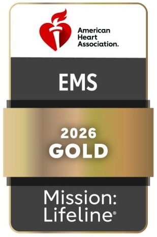 American Heart Association badge with a red heart logo, text "EMS 2026 GOLD," and "Mission: Lifeline" on a gold and black background.